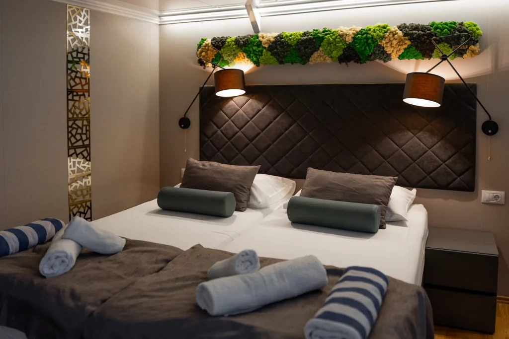 Double cabin aboard a Zantium small cruise ship with en-suite accommodation and modern interior.